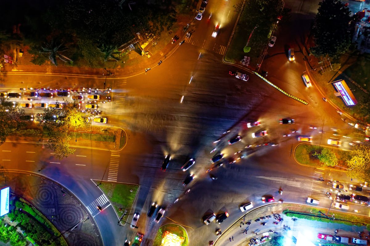 Aerial view of a large road intersection at night